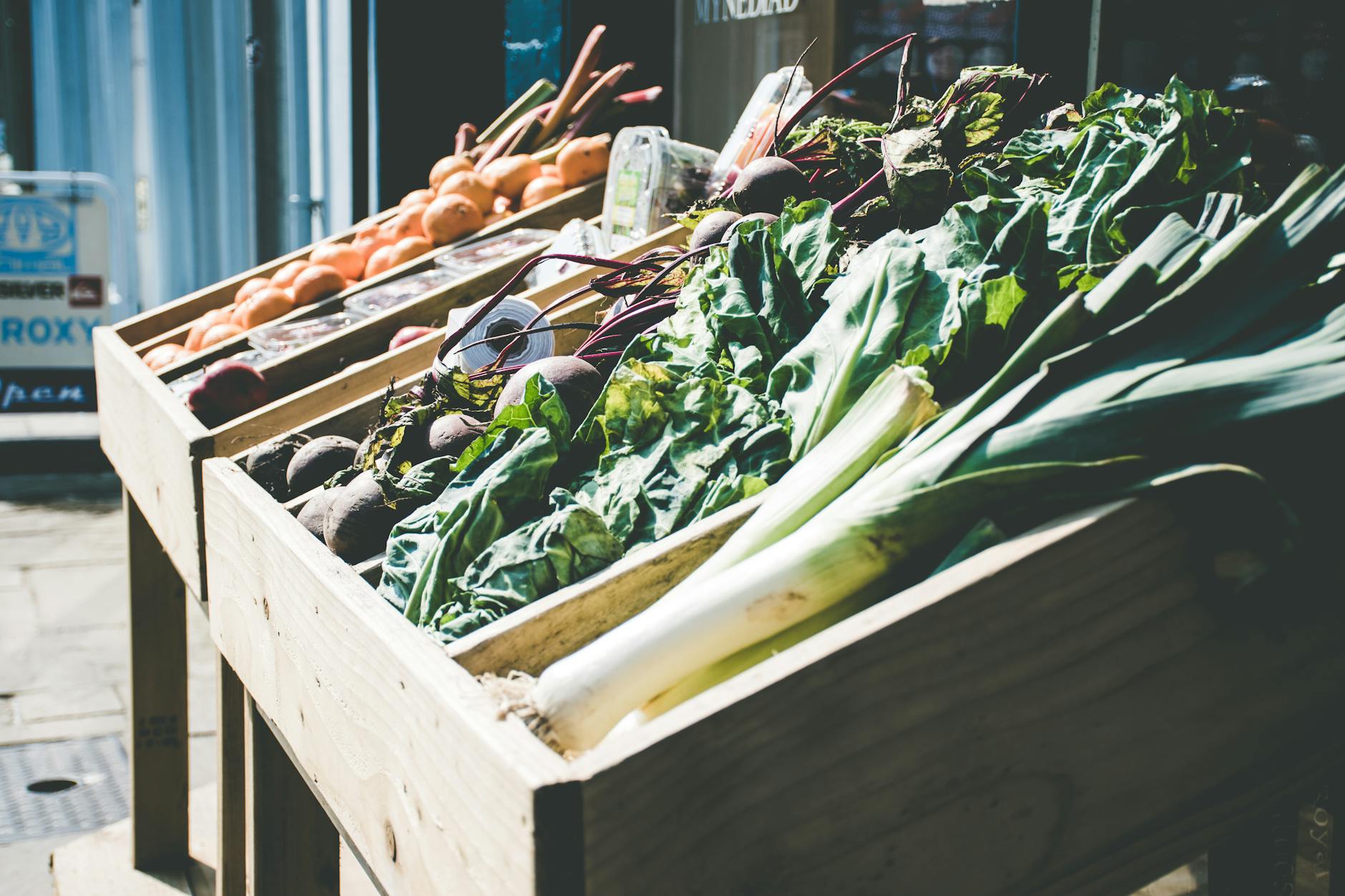 Fresh colourful vegetables and produce displayed at a farm shop