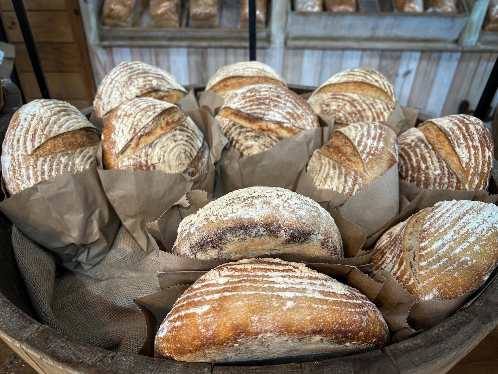 Freshly baked artisan bread loaves in a bakery