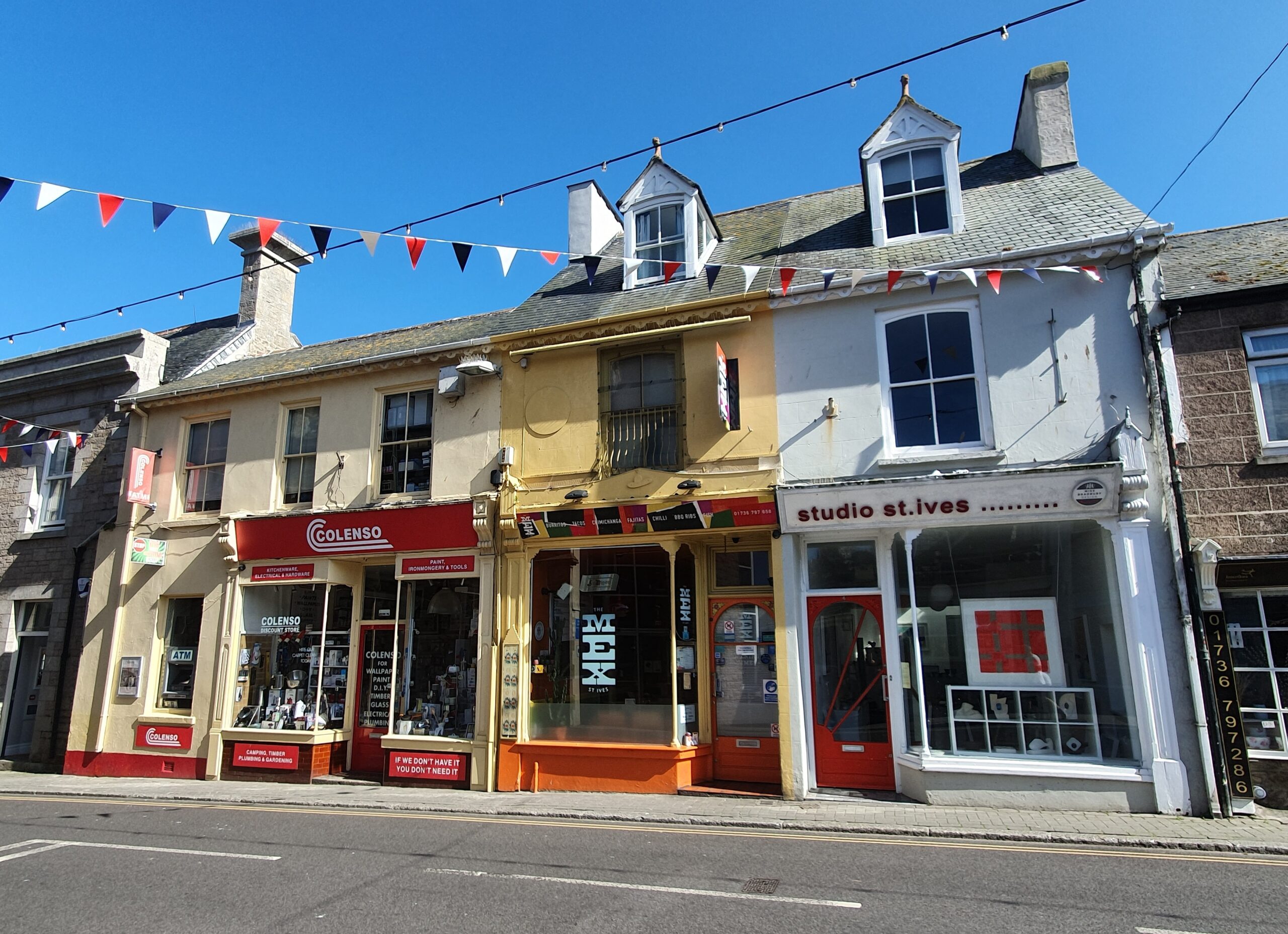 Independent shops and art galleries along a street in St Ives, Cornwall