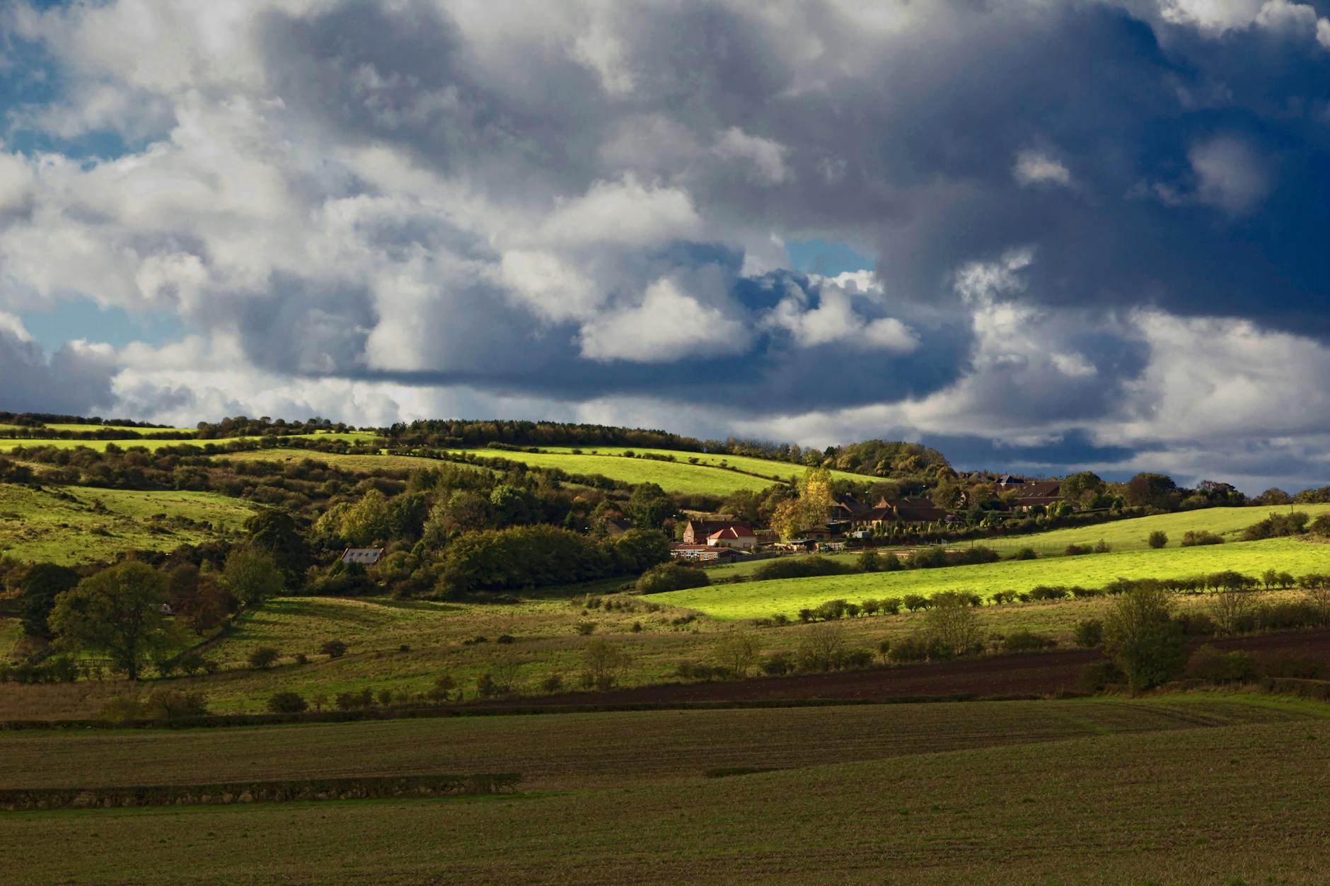 Rolling green fields and farmland in the English countryside