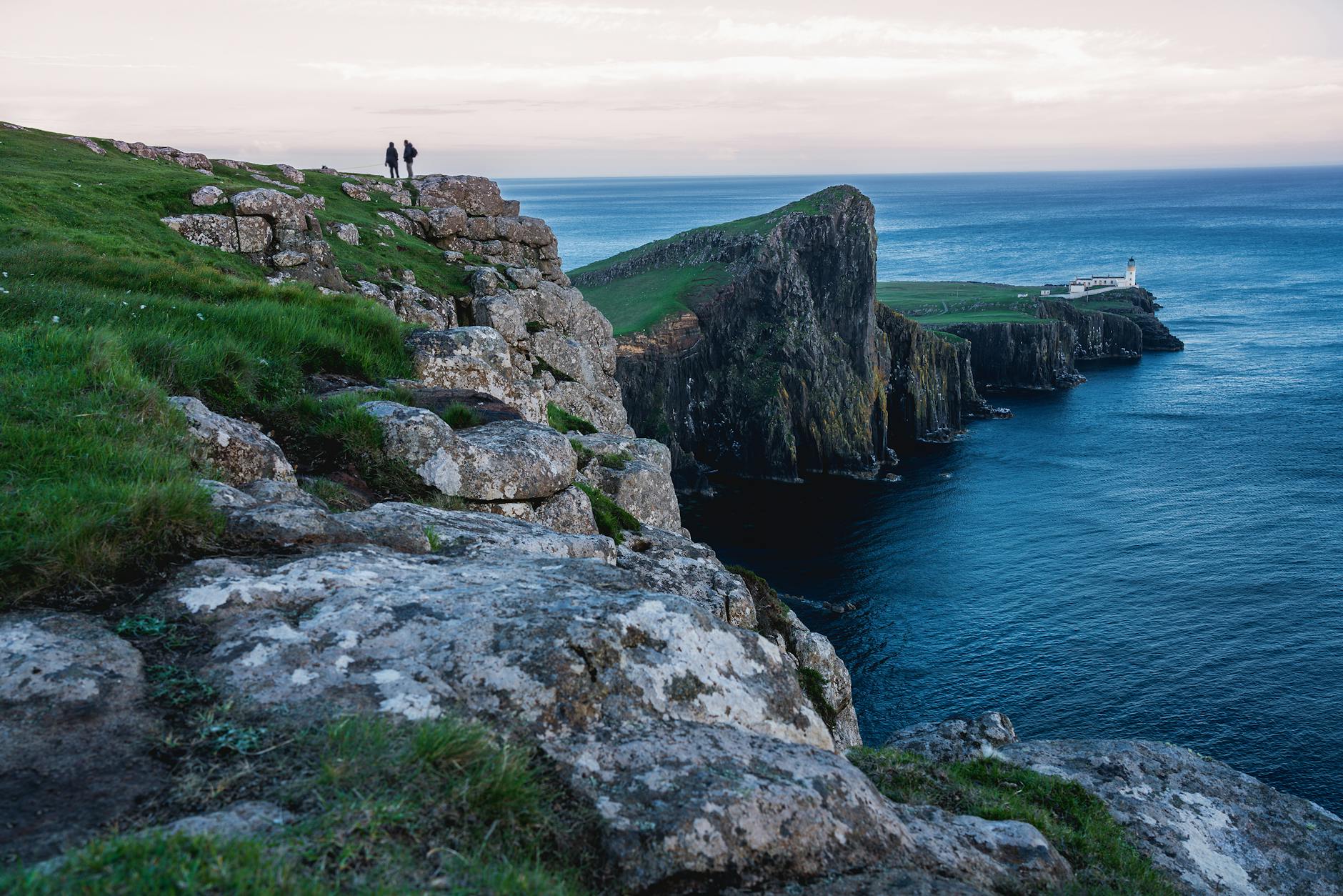 Walkers enjoying a coastal path with stunning sea views