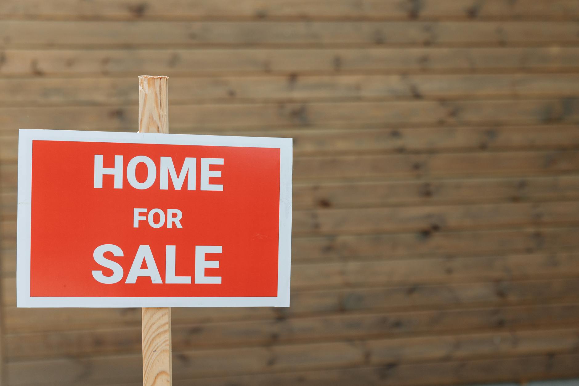 For sale sign outside a cottage property in Cornwall