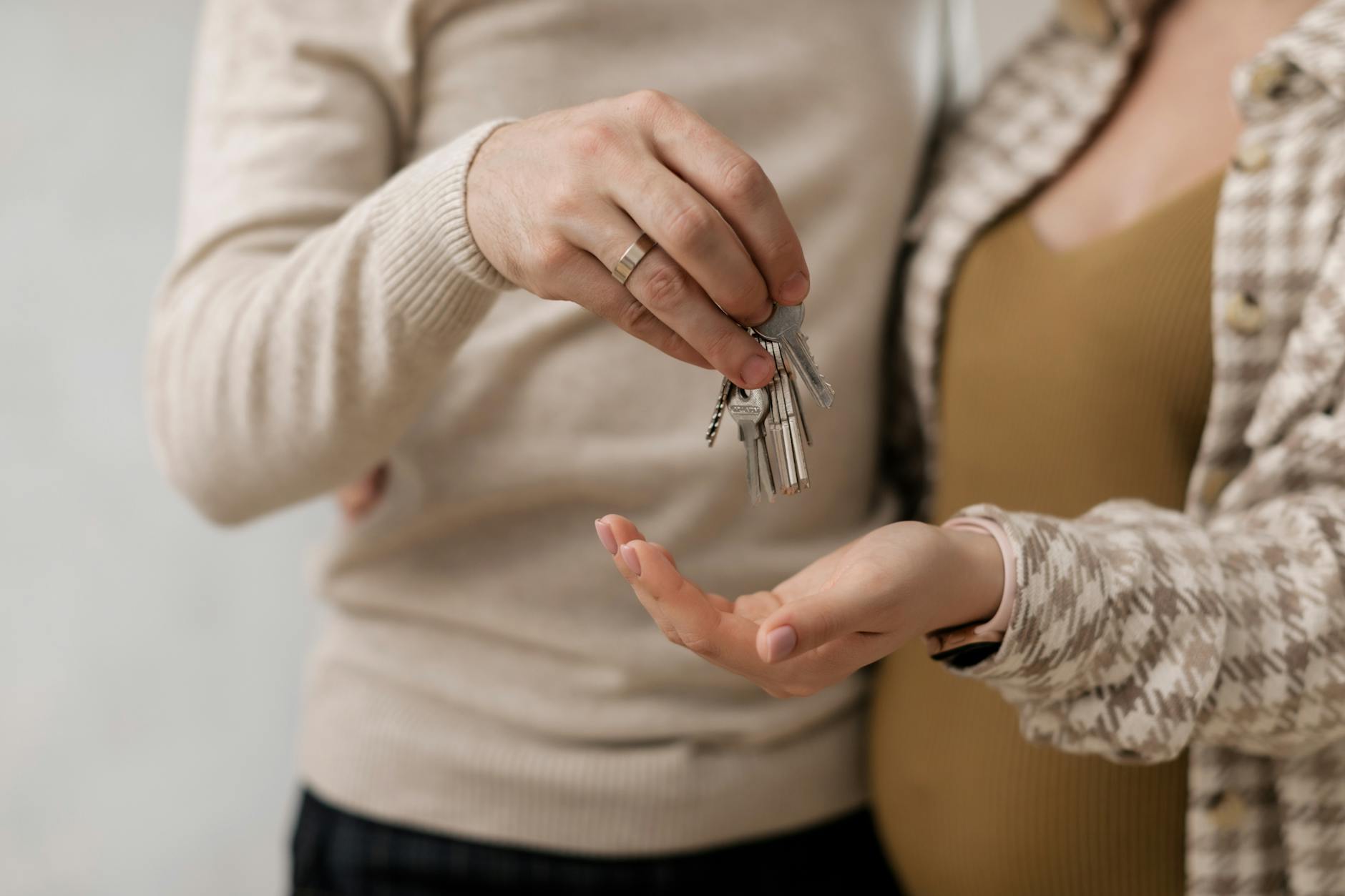 Host handing over keys to a holiday rental property