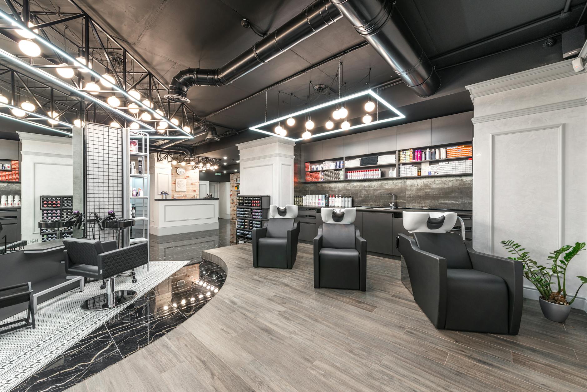 Modern hair salon interior with styling chairs and mirrors
