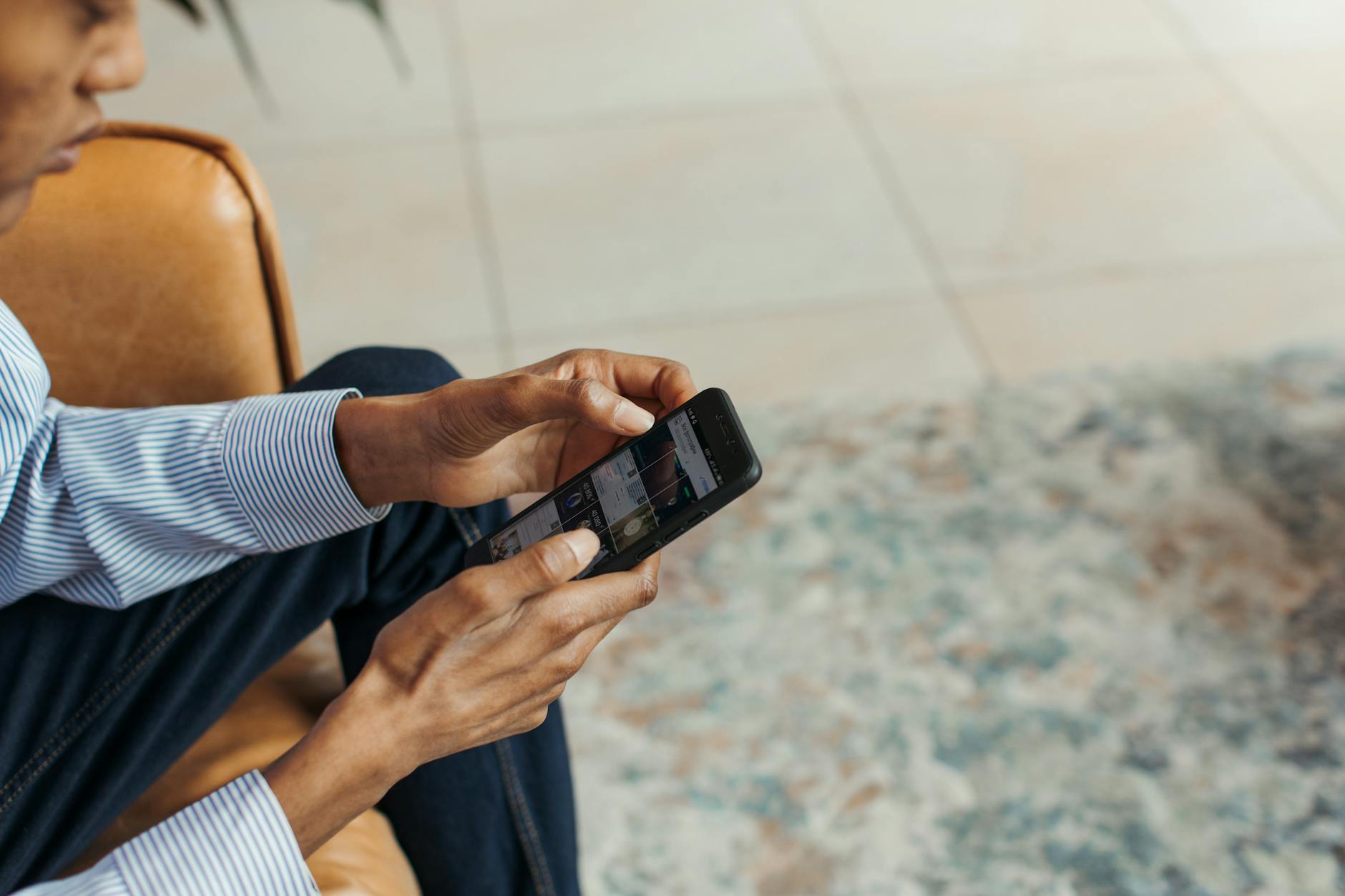 Person leaving an online review on a smartphone