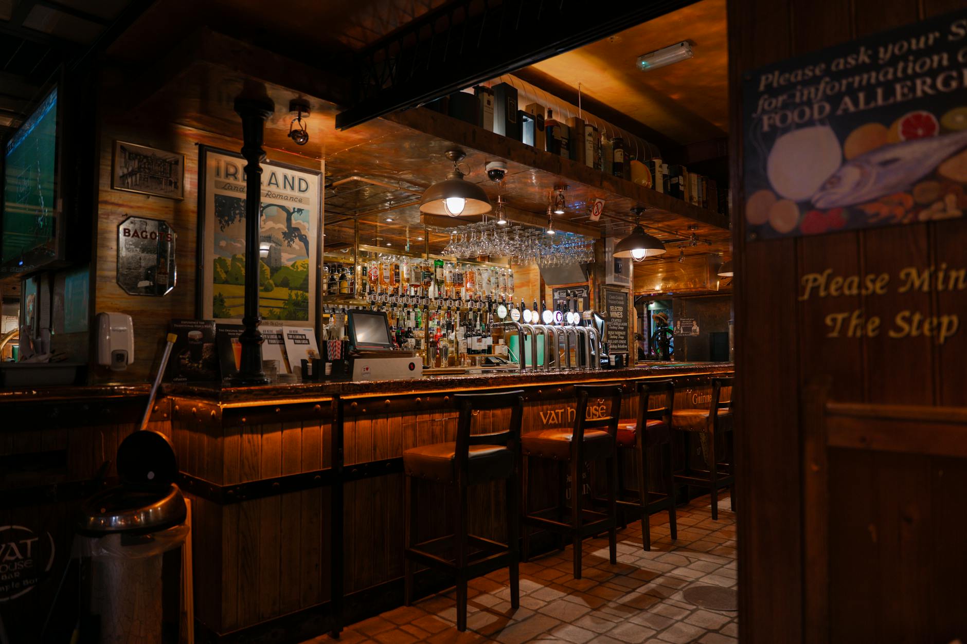 Cosy pub interior with bar and warm atmosphere