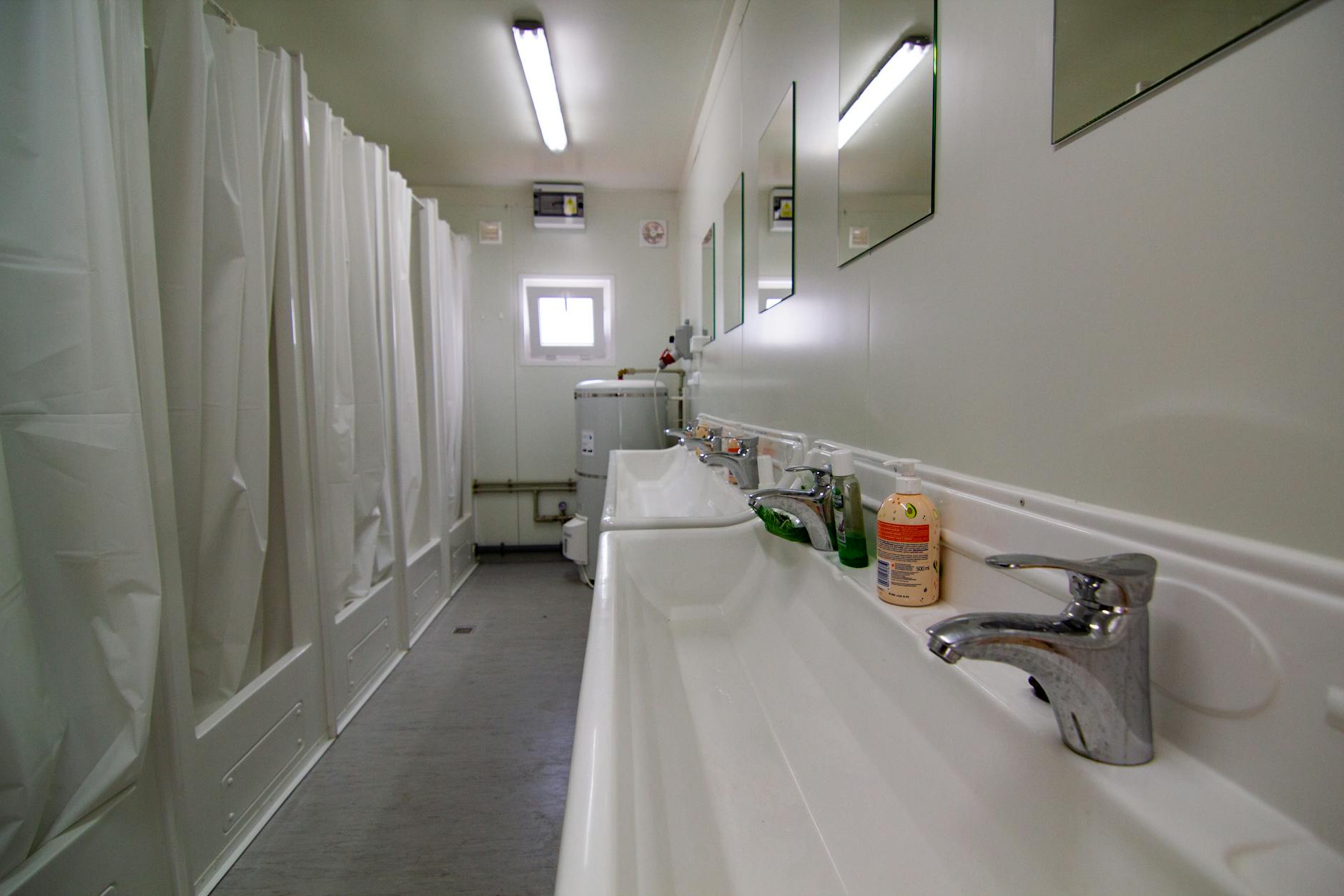 Holiday park facilities including shower block and playground