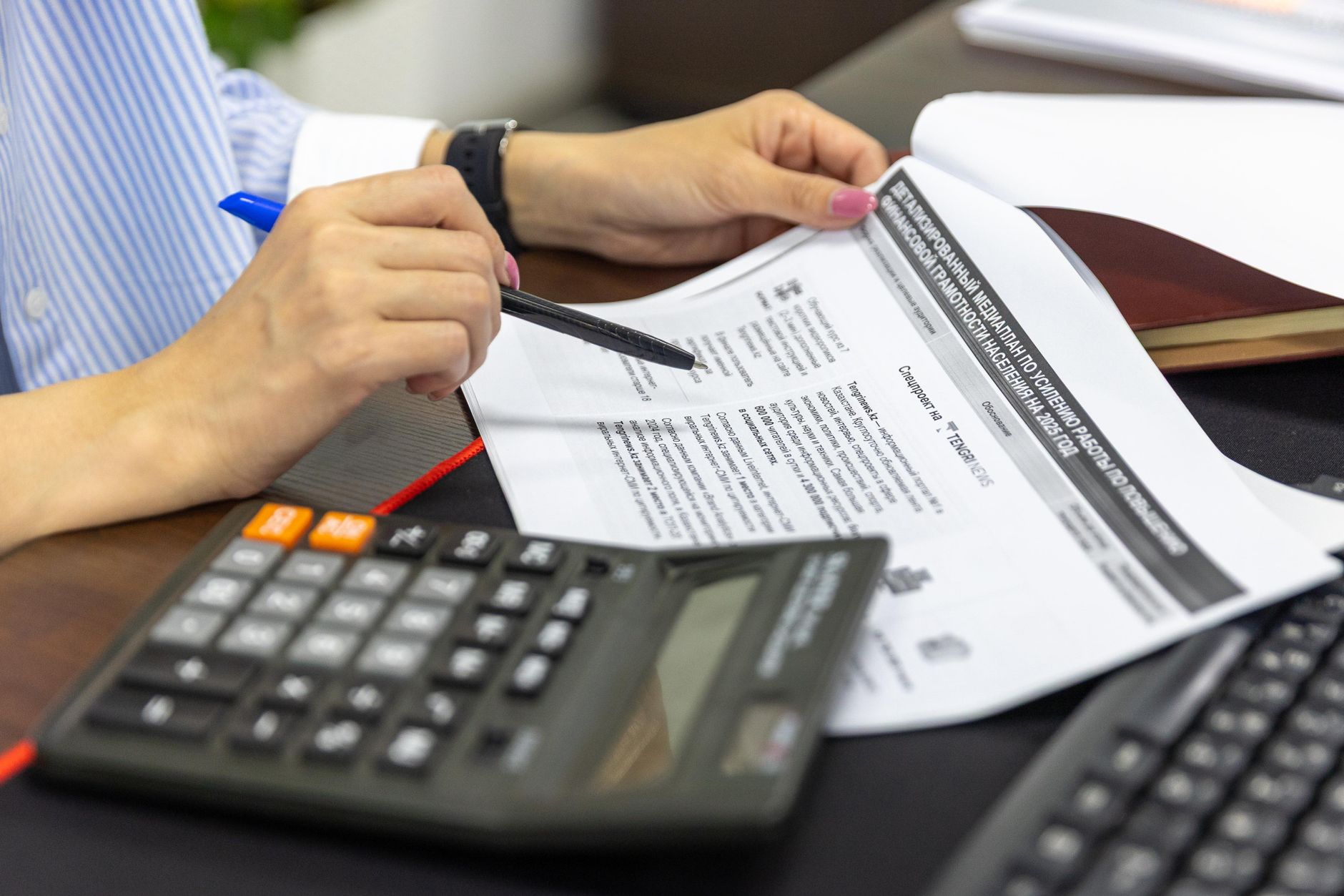 Professional accountant at a desk in a Cornwall office