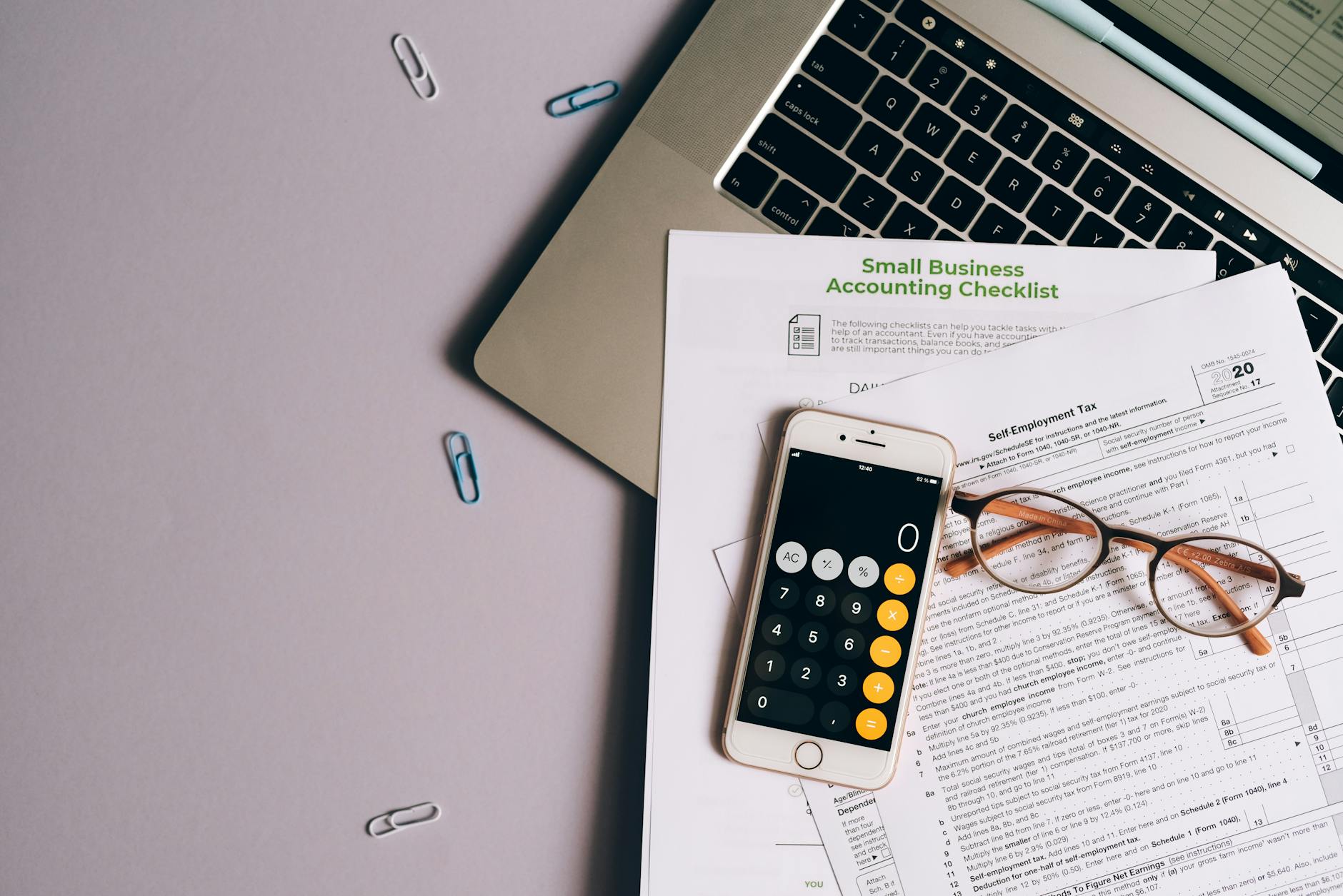 Small business budget planning with documents on a desk
