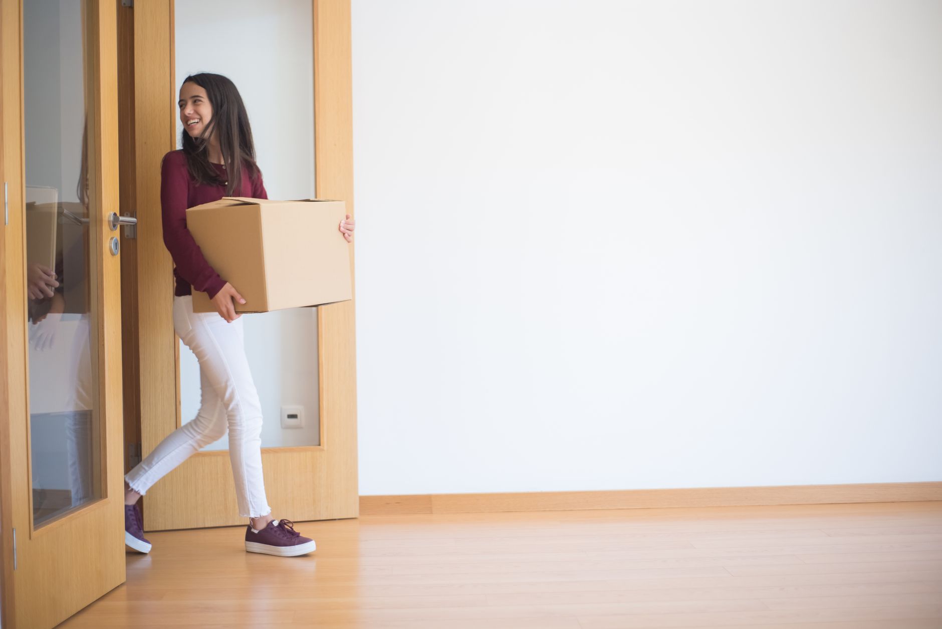 Student moving boxes out of university accommodation