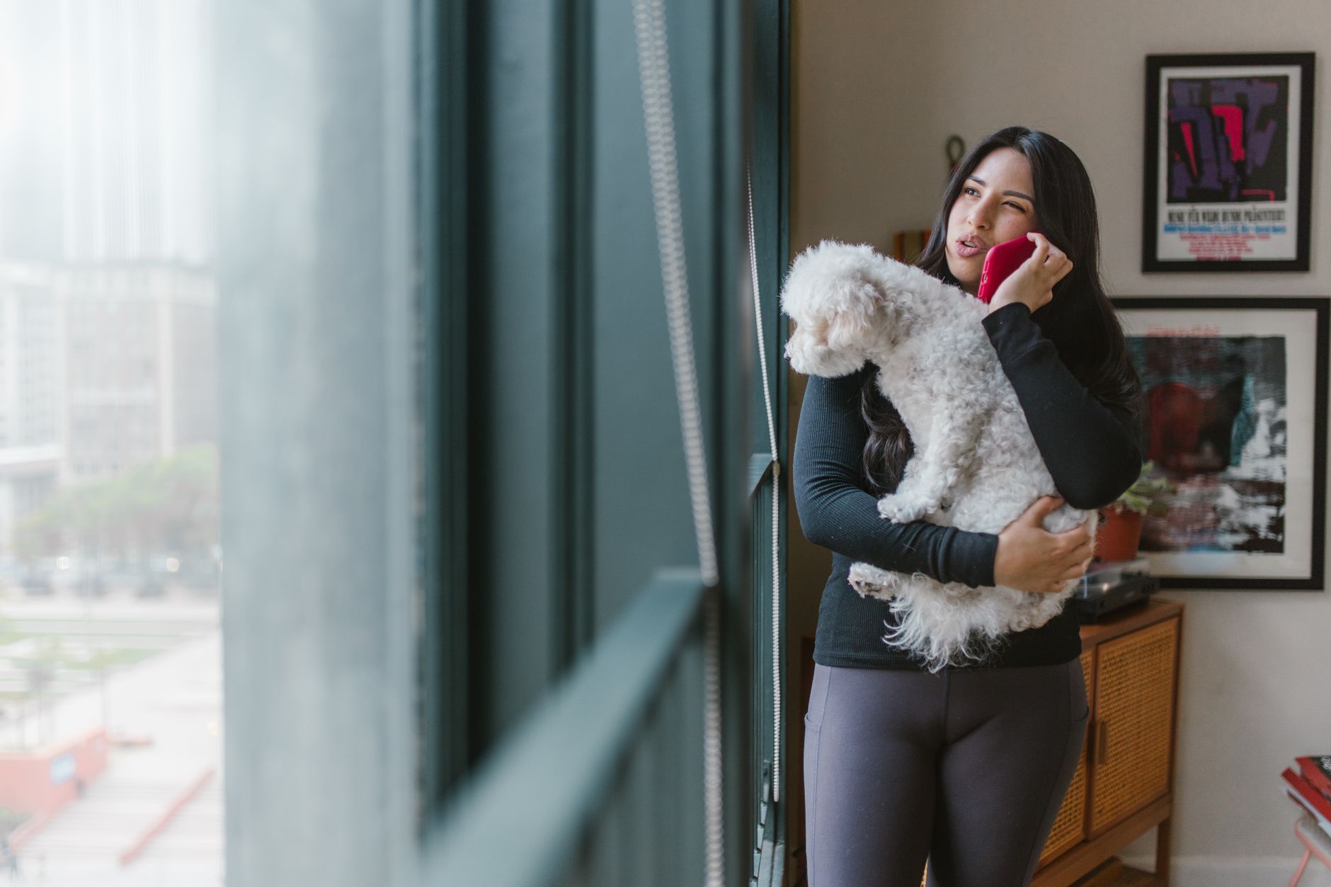 Worried pet owner making a phone call