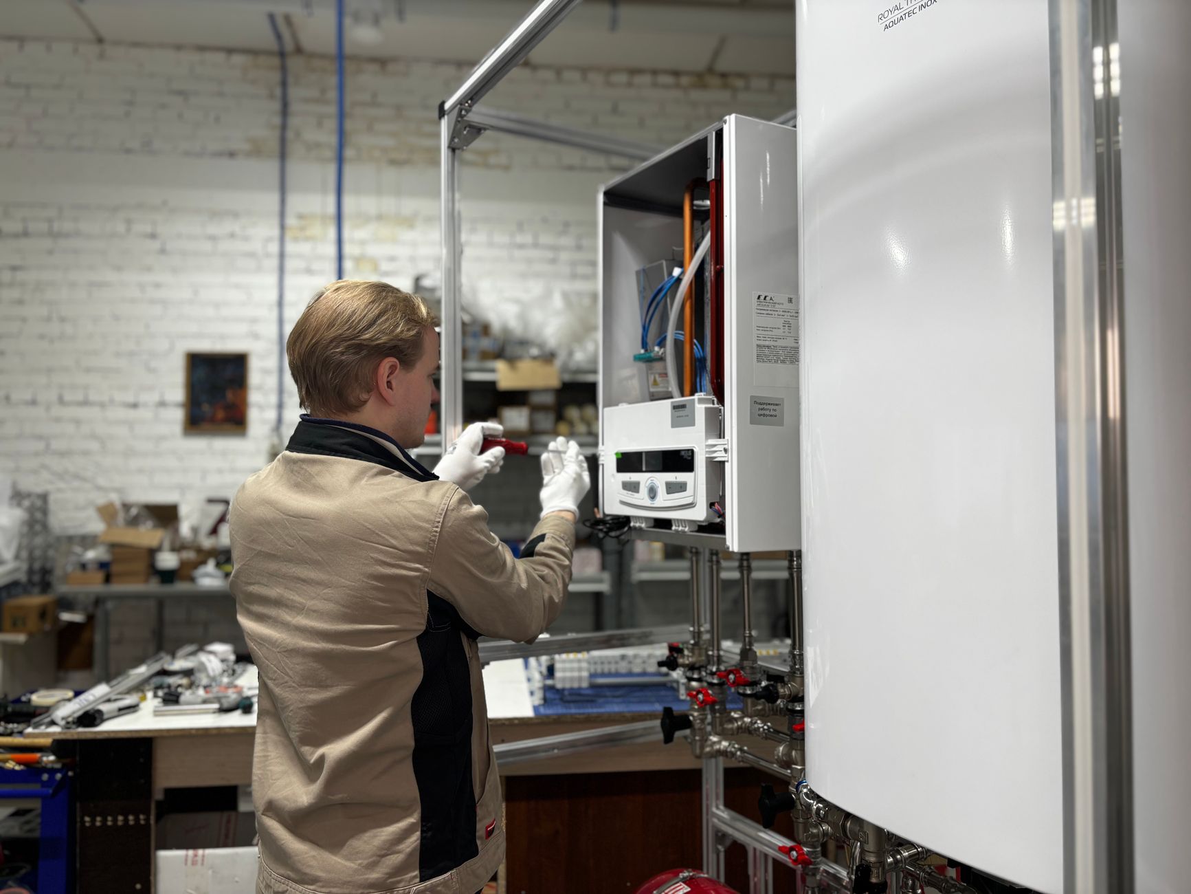 Engineer checking a domestic boiler and heating system