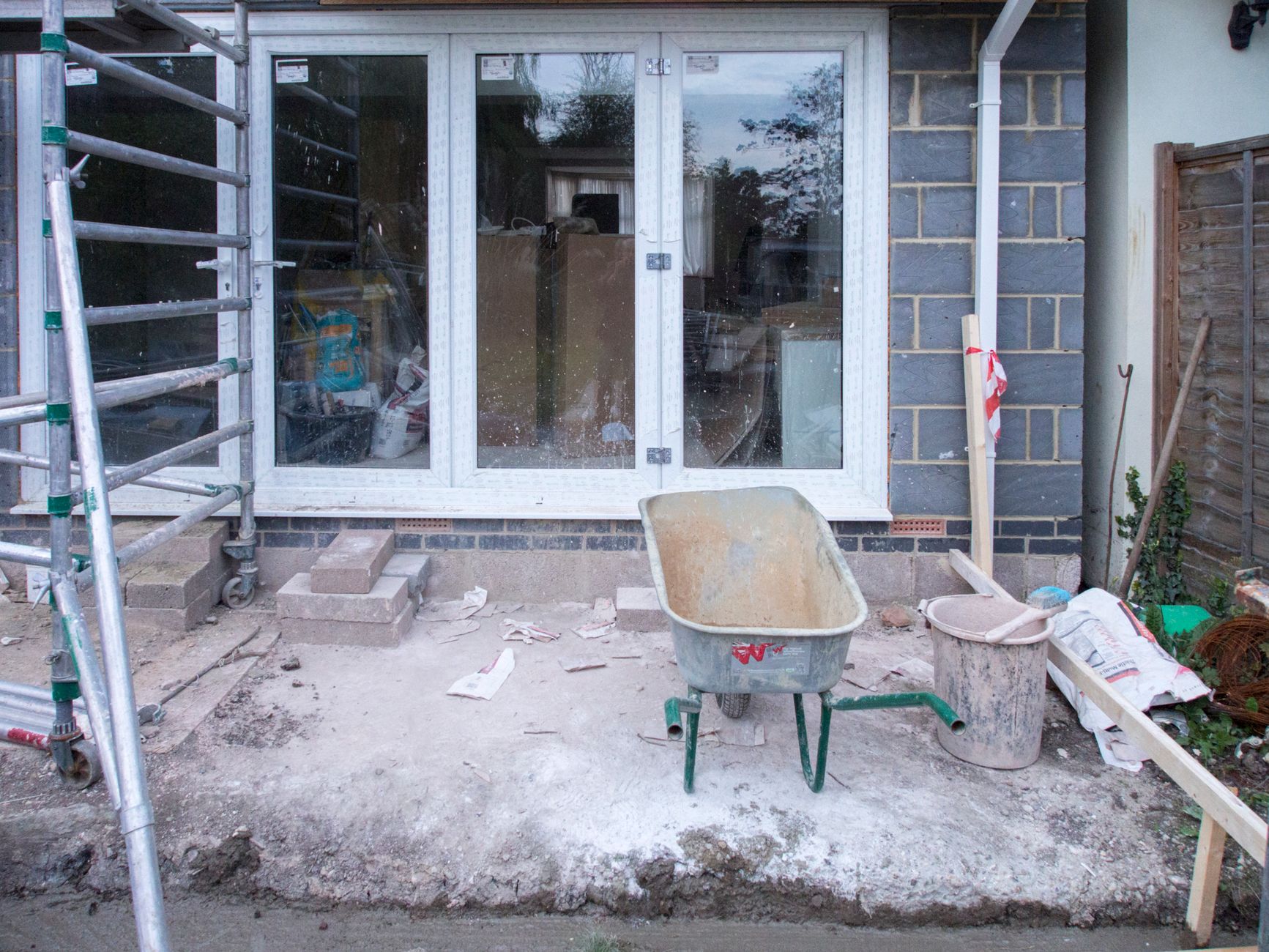 Scaffolding erected around a house during a renovation project